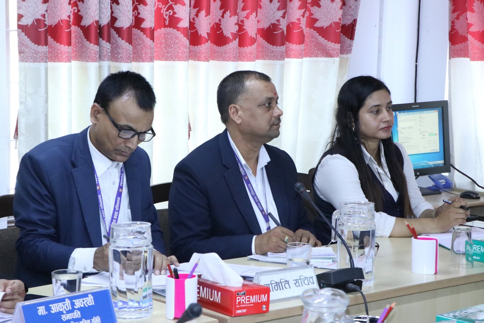 Committee officials participating in the discussion
