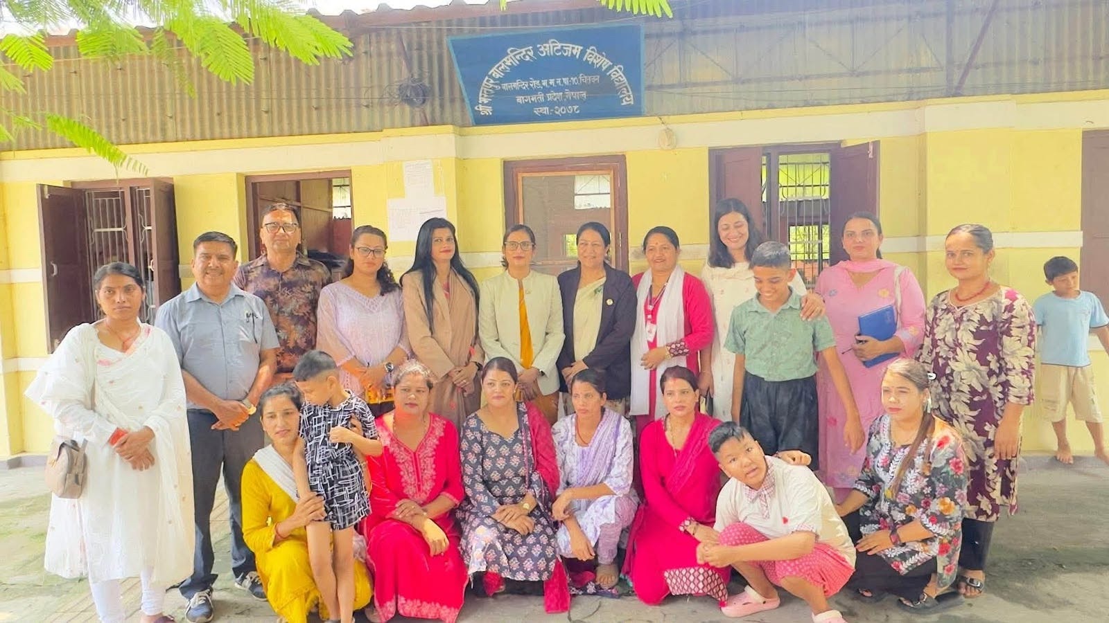 Committee team with students and staff at Balmandir Autism School