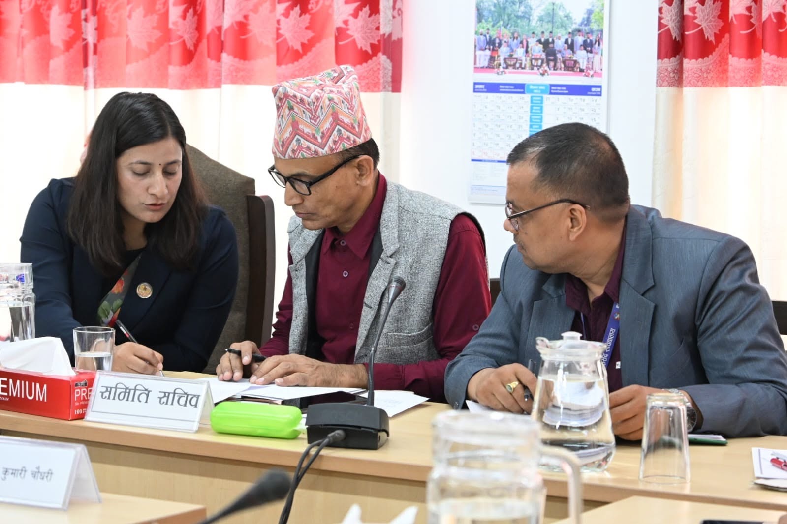 Aakriti Awasthi and committee officials reviewing field visit reports